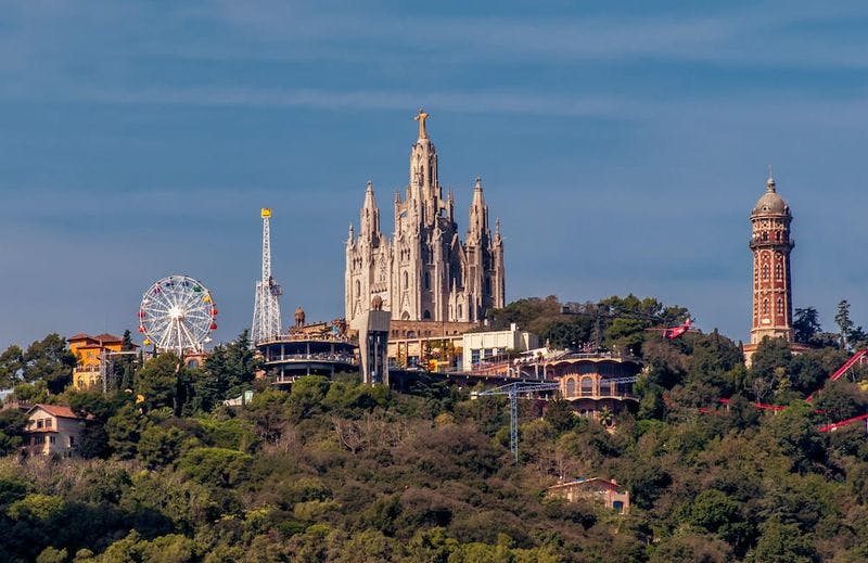 top of tibidabo mountain with church and amusement park