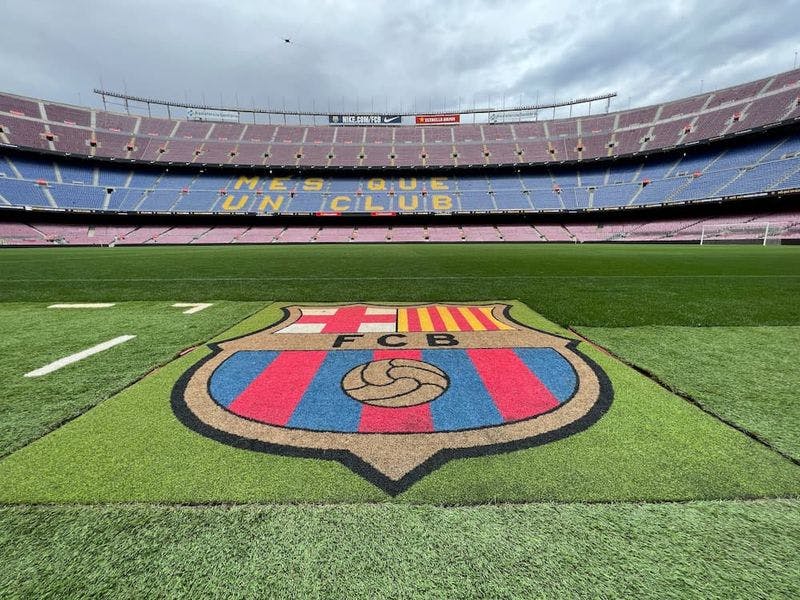 Field of camp nou with FC Barcelona crest